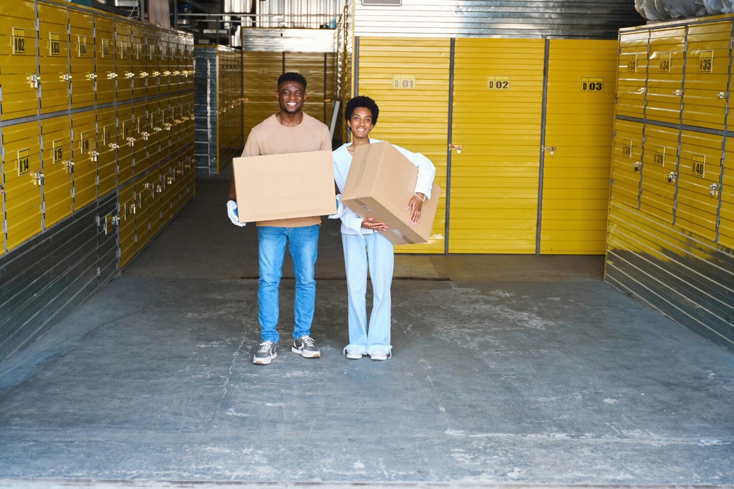 African American young couple rents a storage unit